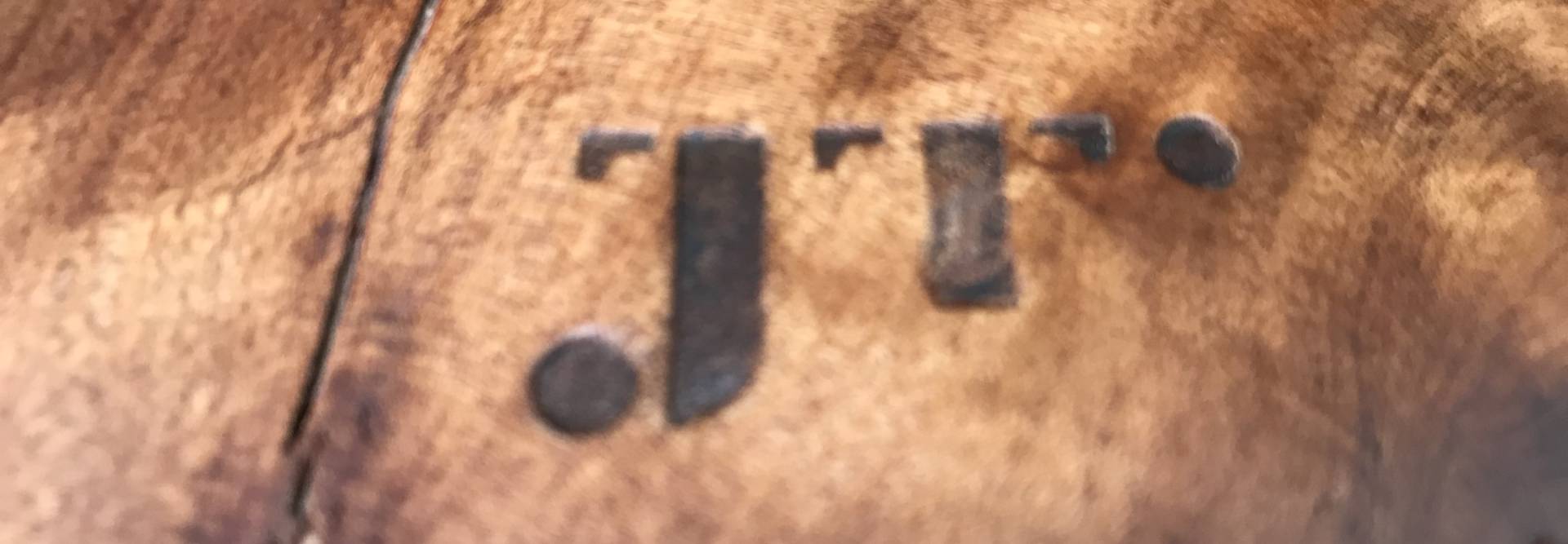An inscription of the maker's name from Kauri Craft and Furniture